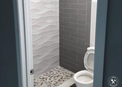Remodeled Bathroom in Vero Beach, with white and gray tiles
