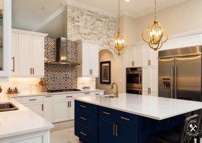 Beautiful luxury home kitchen with white cabinets.