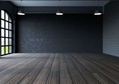 Blank wall in empty room with windows